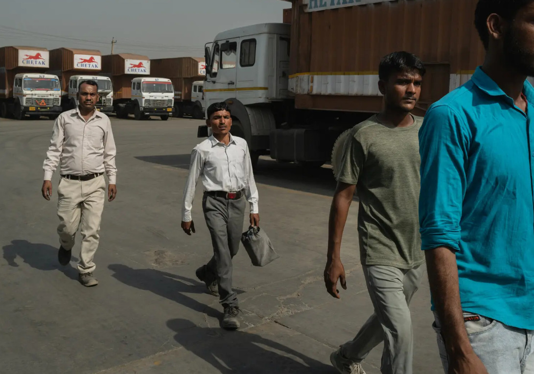 Truck drivers arriving at the chetak foundation truck terminal in haryana