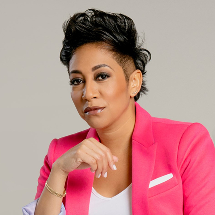Aisha Mills WWSG Headshot in a pink blazer