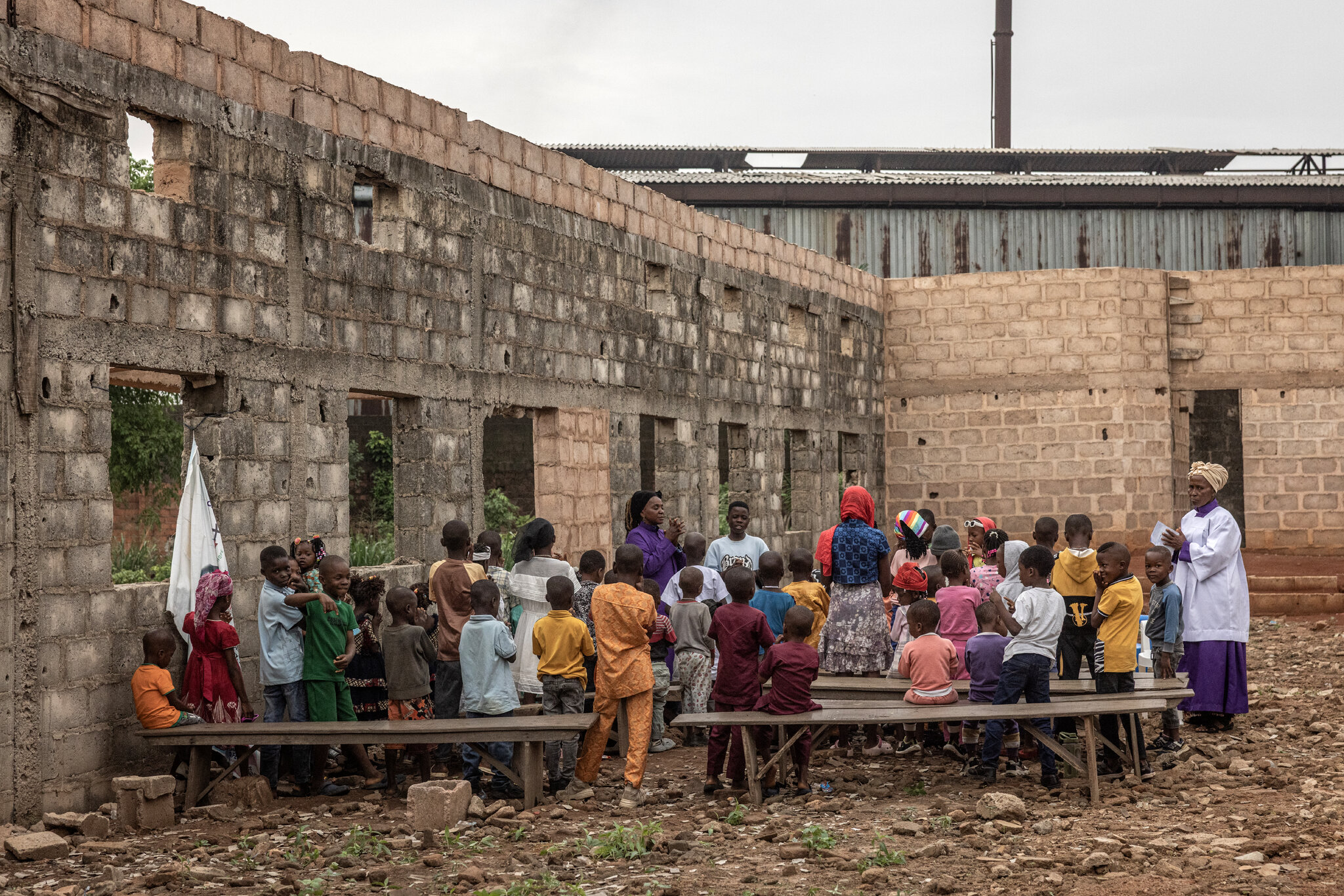 A Sunday Bible session next to a lead smelting plant. Finbarr O'Reilly for The New York Times
