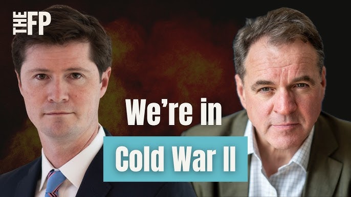 Two men in suits face the camera with FP logo in the corner and a teal banner reading 'We're in Cold War II'