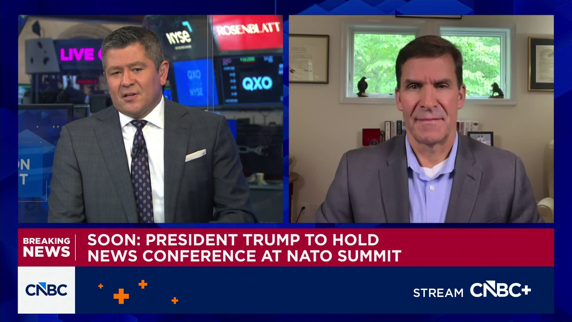Split-screen CNBC broadcast: news anchor on left and guest in a home office on the right, both in suits, with a red breaking-news ticker below reading 'SOON: PRESIDENT TRUMP TO HOLD NEWS CONFERENCE AT NATO SUMMIT'